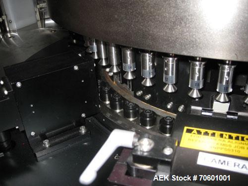 Used Eisai Sterile Rotary Vial Inspection Unit, Model 125-596.Designed for speeds up to 300 vials/minute,designed for 2, 5 and 10 ml vials for clear and suspension type products, 30 mm max diameter x...