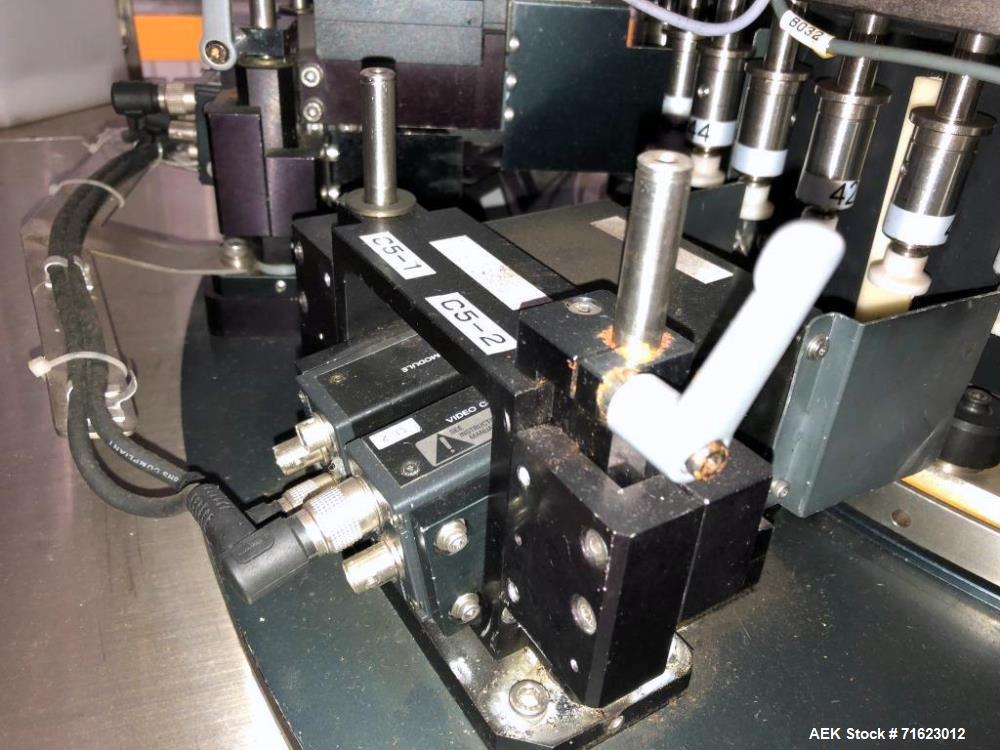 Used EISAI Type EIS596 Vial Inspection Machine.