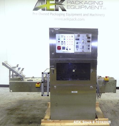 Used Nikka Densok Model HD1-1S High Voltage Pharmaceutical Pin Hole Detection System. Set for plastic vials and capable of speeds up to 300 vials per minute. Has a max card size: 150mm wide x 110mm t...