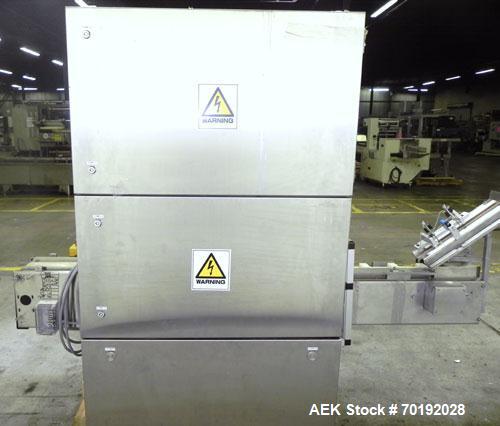 Used Nikka Densok Model HD1-1S High Voltage Pharmaceutical Pin Hole Detection System. Set for plastic vials and capable of speeds up to 300 vials per minute. Has a max card size: 150mm wide x 110mm t...