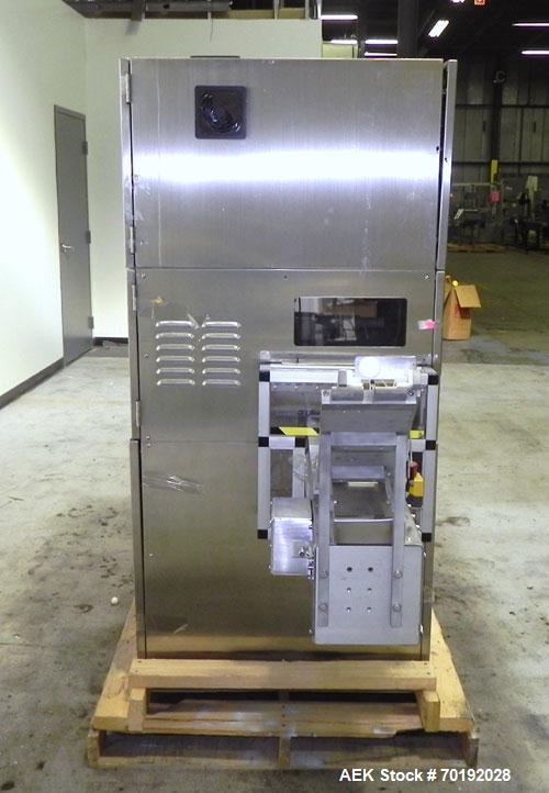 Used Nikka Densok Model HD1-1S High Voltage Pharmaceutical Pin Hole Detection System. Set for plastic vials and capable of speeds up to 300 vials per minute. Has a max card size: 150mm wide x 110mm t...