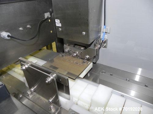 Used Nikka Densok Model HD1-1S High Voltage Pharmaceutical Pin Hole Detection System. Set for plastic vials and capable of speeds up to 300 vials per minute. Has a max card size: 150mm wide x 110mm t...