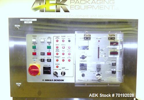 Used Nikka Densok Model HD1-1S High Voltage Pharmaceutical Pin Hole Detection System. Set for plastic vials and capable of speeds up to 300 vials per minute. Has a max card size: 150mm wide x 110mm t...