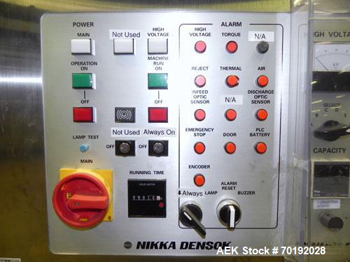 Used Nikka Densok Model HD1-1S High Voltage Pharmaceutical Pin Hole Detection System. Set for plastic vials and capable of speeds up to 300 vials per minute. Has a max card size: 150mm wide x 110mm t...