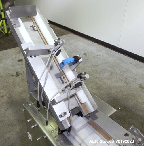 Used Nikka Densok Model HD1-1S High Voltage Pharmaceutical Pin Hole Detection System. Set for plastic vials and capable of speeds up to 300 vials per minute. Has a max card size: 150mm wide x 110mm t...