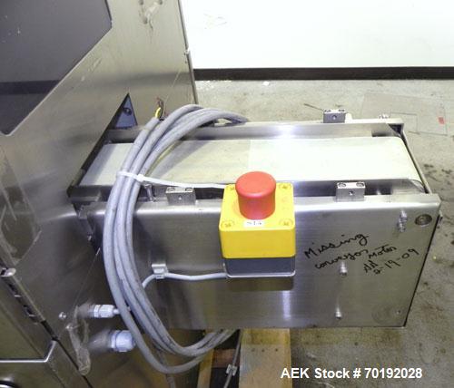 Used Nikka Densok Model HD1-1S High Voltage Pharmaceutical Pin Hole Detection System. Set for plastic vials and capable of speeds up to 300 vials per minute. Has a max card size: 150mm wide x 110mm t...