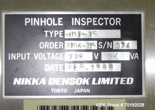 Used Nikka Densok Model HD1-1S High Voltage Pharmaceutical Pin Hole Detection System. Set for plastic vials and capable of speeds up to 300 vials per minute. Has a max card size: 150mm wide x 110mm t...