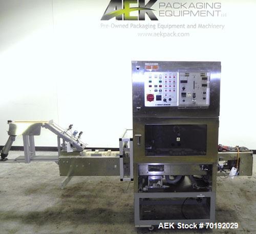 Used Nikka Densok Model HD1-1S High Voltage Pharmaceutical Pin Hole Detection System. Set for plastic vials and capable of speeds up to 300 vials per minute. Has a max card size: 150mm wide x 110mm t...