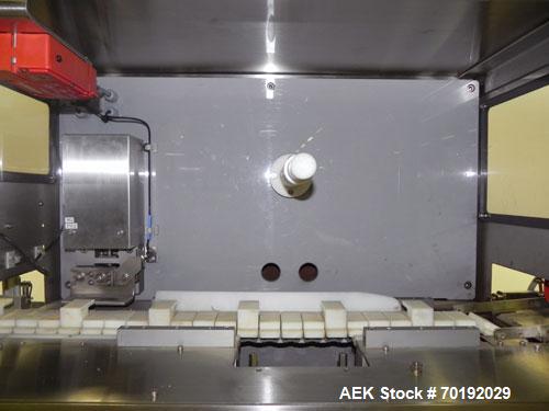 Used Nikka Densok Model HD1-1S High Voltage Pharmaceutical Pin Hole Detection System. Set for plastic vials and capable of speeds up to 300 vials per minute. Has a max card size: 150mm wide x 110mm t...