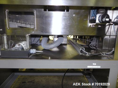 Used Nikka Densok Model HD1-1S High Voltage Pharmaceutical Pin Hole Detection System. Set for plastic vials and capable of speeds up to 300 vials per minute. Has a max card size: 150mm wide x 110mm t...