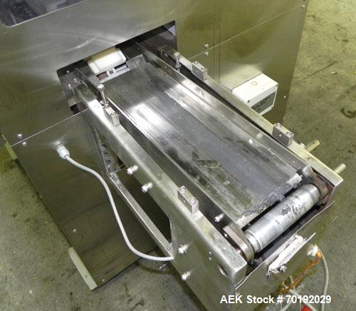 Used Nikka Densok Model HD1-1S High Voltage Pharmaceutical Pin Hole Detection System. Set for plastic vials and capable of speeds up to 300 vials per minute. Has a max card size: 150mm wide x 110mm t...