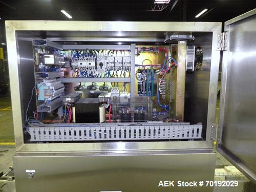 Used Nikka Densok Model HD1-1S High Voltage Pharmaceutical Pin Hole Detection System. Set for plastic vials and capable of speeds up to 300 vials per minute. Has a max card size: 150mm wide x 110mm t...