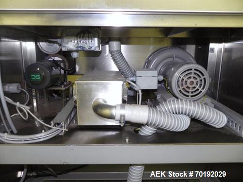 Used Nikka Densok Model HD1-1S High Voltage Pharmaceutical Pin Hole Detection System. Set for plastic vials and capable of speeds up to 300 vials per minute. Has a max card size: 150mm wide x 110mm t...