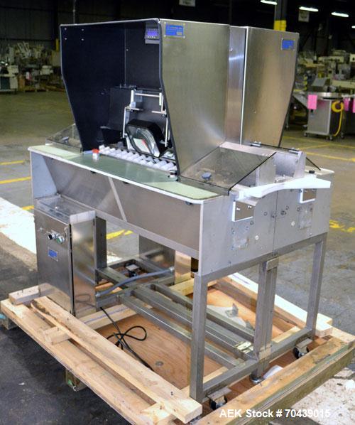 Used Dabrico DI-100 LT Semi Automatic Vial, Ampoule, Syringe Inspection Machine capable of speeds up to 150 vials per minute (per side). Back to back unit. Container size range: Vials/Cartridges 1ml ...