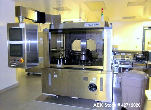 Used ESAI Rotary Vial Inspection Unit, Model EIS 596. 30mm Maximum flange diameter, 115mm maximum vial height. Rated up to 18,000 units an hour. PRICE INCLUDES A 15% BUYERS PREMIUM. AS IS WHERE IS, L...