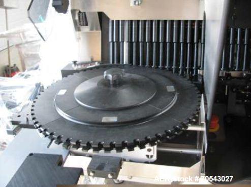 Unused - Seidenader Semi-Automatic Syringe Inspection Machine.  Vials 3 and 4 ml.  Diameter 0.64" (16.25 mm) x height 1.34" or 1.48" (34 or 37.5 mm).  Syringe diameter 0.43" (10.85 mm).  Maximum outp...