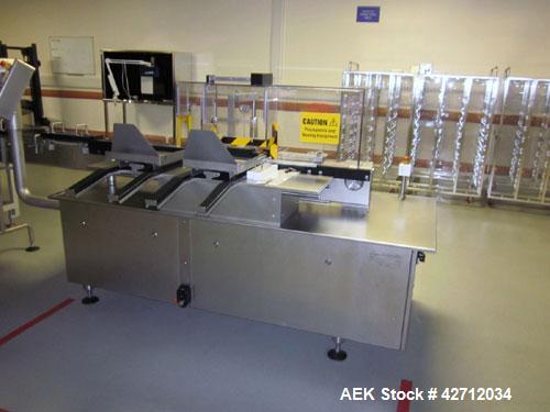 Used Seidenader Vial Inspection System Consisting Of: (2) Model V90-AVSB/75LR/RL vial inspection units, designed to inspect ampules, vials, syringes, bottles and tubes, .5-1000ml size range, rated up...