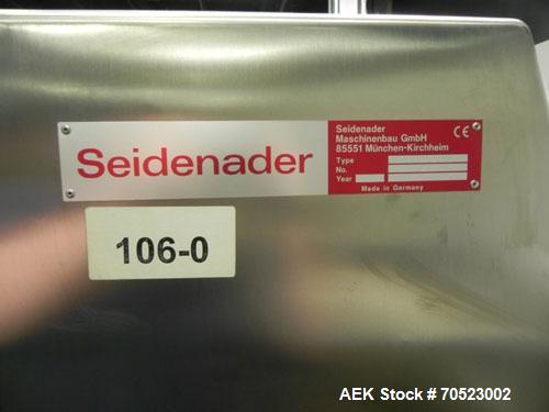 Used Seidenader Model V90-AVSB/60-LR Vial Inspection Machine. Capable of speeds up to 150 objects per minute. Has starwheel tray infeed and straight line discharge to tray. Machine equipped for vials...