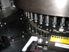 Used Eisai Sterile Rotary Vial Inspection Unit, Model 125-596.Designed for speeds up to 300 vials/minute,designed for 2, 5 and 10 ml vials for clear and suspension type products, 30 mm max diameter x...