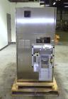 Used Nikka Densok Model HD1-1S High Voltage Pharmaceutical Pin Hole Detection System. Set for plastic vials and capable of speeds up to 300 vials per minute. Has a max card size: 150mm wide x 110mm t...