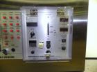 Used Nikka Densok Model HD1-1S High Voltage Pharmaceutical Pin Hole Detection System. Set for plastic vials and capable of speeds up to 300 vials per minute. Has a max card size: 150mm wide x 110mm t...