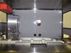Used Nikka Densok Model HD1-1S High Voltage Pharmaceutical Pin Hole Detection System. Set for plastic vials and capable of speeds up to 300 vials per minute. Has a max card size: 150mm wide x 110mm t...