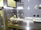 Used Nikka Densok Model HD1-1S High Voltage Pharmaceutical Pin Hole Detection System. Set for plastic vials and capable of speeds up to 300 vials per minute. Has a max card size: 150mm wide x 110mm t...