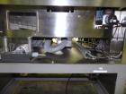 Used Nikka Densok Model HD1-1S High Voltage Pharmaceutical Pin Hole Detection System. Set for plastic vials and capable of speeds up to 300 vials per minute. Has a max card size: 150mm wide x 110mm t...