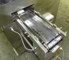 Used Nikka Densok Model HD1-1S High Voltage Pharmaceutical Pin Hole Detection System. Set for plastic vials and capable of speeds up to 300 vials per minute. Has a max card size: 150mm wide x 110mm t...