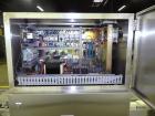 Used Nikka Densok Model HD1-1S High Voltage Pharmaceutical Pin Hole Detection System. Set for plastic vials and capable of speeds up to 300 vials per minute. Has a max card size: 150mm wide x 110mm t...