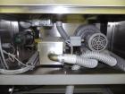Used Nikka Densok Model HD1-1S High Voltage Pharmaceutical Pin Hole Detection System. Set for plastic vials and capable of speeds up to 300 vials per minute. Has a max card size: 150mm wide x 110mm t...