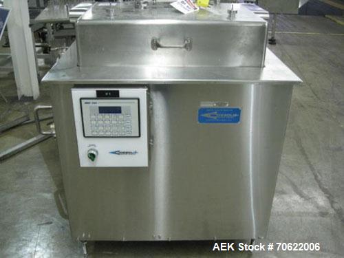 Used Cozzoli Vial Washer, Model GW-24, Stainless Steel Construction. Rated up to 23,000 vials/hour, batch design, with change parts and controls, serial #GW24-250.  NOTE PRICE INCLUDES A 15% BUYERS P...