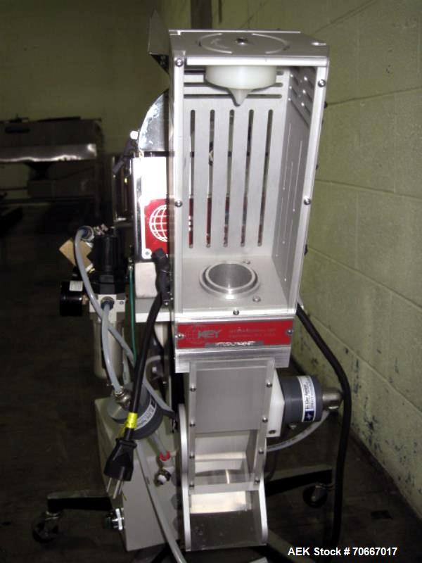 Used Key capsule polisher, model CP350, stainles steel construction with Key MTCS empty capsule reject, on stand, 110V, serial # J14967.  NOTE: PRICE INCLUDES A 15% BUYERS PREMIUM.