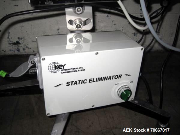 Used Key capsule polisher, model CP350, stainles steel construction with Key MTCS empty capsule reject, on stand, 110V, serial # J14967.  NOTE: PRICE INCLUDES A 15% BUYERS PREMIUM.