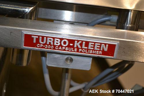 Used Key Industries Turbo-Kleen Capsule Polisher, Model CP-300, Stainless Steel. Includes a speed controller. Mounted on an aluminum base with casters.