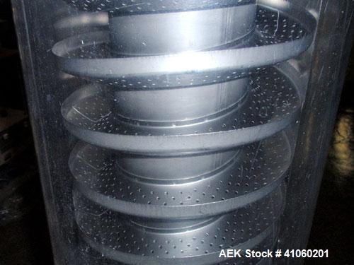 Used Kramer Tablet Deduster, Model E2000-500 IR. Approximate capacity 60,000 to 3,000,000 capsules per hour depending on size. Maximum tablet 25mm. 110-240 volt, 50/60 hz. Includes a C810 control pan...