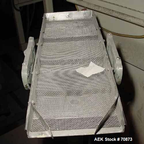 USED:Stokes tablet duster, model 900-571-1, stainless steel. 9-1/2"wide x 22" long vibration screens. Bottom mounted dust collector,1-1/2" diameter dust outlet. Capacity approx 7000 tablets per minut...