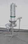 Used Kramer Model E92-500 Uphill Spiral Tablet Deduster. Approximate 1,800,000 tph, based on round 5 x 2mm tablets. Maximum tablet diameter 20mm. Maximum dedusting path 6.8m. Conveying height 490mm. ...