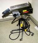Used Key International Tablet Deduster, Model TD-101, 304 Stainless Steel. Air volume 1 to 2 cfm, vacuum 20 to 30 cfm. 115 volt. Mounted on stand with casters.