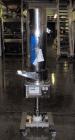 Used Kramer Tablet Deduster, Model E2000-500 IR. Approximate capacity 60,000 to 3,000,000 capsules per hour depending on size. Maximum tablet 25mm. 110-240 volt, 50/60 hz. Includes a C810 control pan...