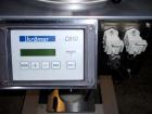 Used Kramer Tablet Deduster, Model E2000-500 IR. Approximate capacity 60,000 to 3,000,000 capsules per hour depending on size. Maximum tablet 25mm. 110-240 volt, 50/60 hz. Includes a C810 control pan...