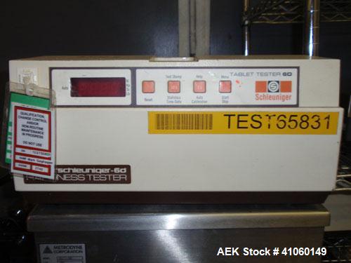 Used Dr. Schleuniger Pharmatron Tablet Hardness Tester, Model 6D. Approximate capacities: 25 tablets/3 minutes. Thickness 0-15mm (0-0.6’’), Diameter 0-35mm (0-1.4’’), Hardness and Tolerance 400-500-8...