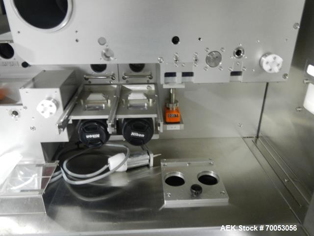 Used Used GEA Daiichi Viswill tablet video inspection system, model TVIS-EX3, rated to speeds of 350,000 tablets/hr through put, designed to handle 5-12 mm diameter to 2-8 mm round tablets, 5-12 mm w...