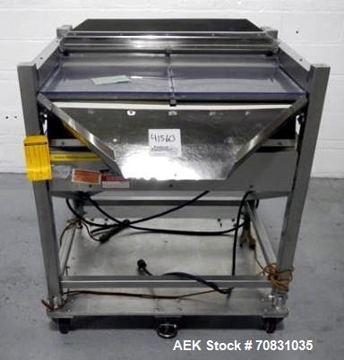 Used Ackely Tablet Sorter, Stainless Steel Construciton. Gravity feed with 14" x 34" wide sorting table, serial# 99634, new 2000.
