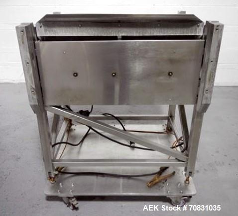 Used Ackely Tablet Sorter, Stainless Steel Construciton. Gravity feed with 14" x 34" wide sorting table, serial# 99634, new 2000.