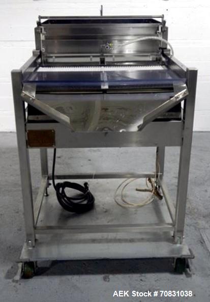 Used Ackely Tablet Sorter, Stainless Steel Construciton. Gravity feed with 14" x 34" wide sorting table, serial# 199, new 1997.