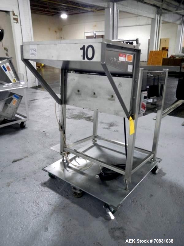Used Ackely Tablet Sorter, Stainless Steel Construciton. Gravity feed with 14" x 34" wide sorting table, serial# 199, new 1997.
