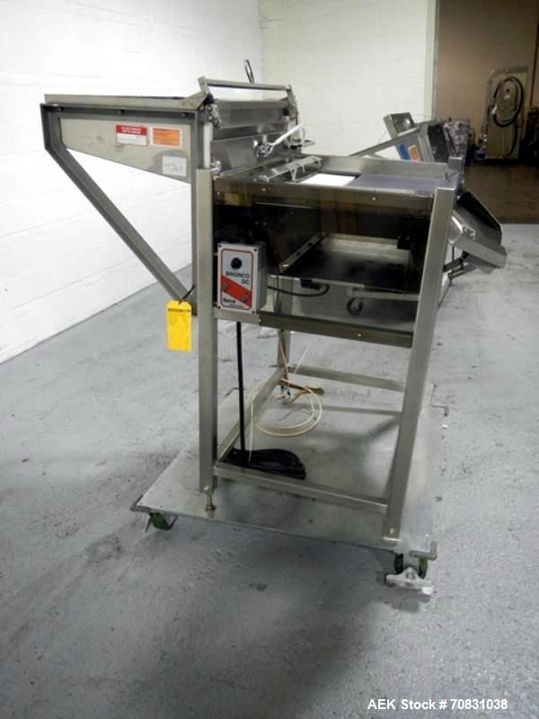 Used Ackely Tablet Sorter, Stainless Steel Construciton. Gravity feed with 14" x 34" wide sorting table, serial# 199, new 1997.