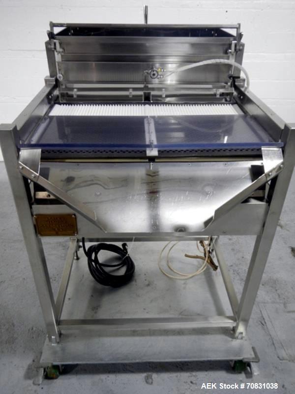 Used Ackely Tablet Sorter, Stainless Steel Construciton. Gravity feed with 14" x 34" wide sorting table, serial# 199, new 1997.