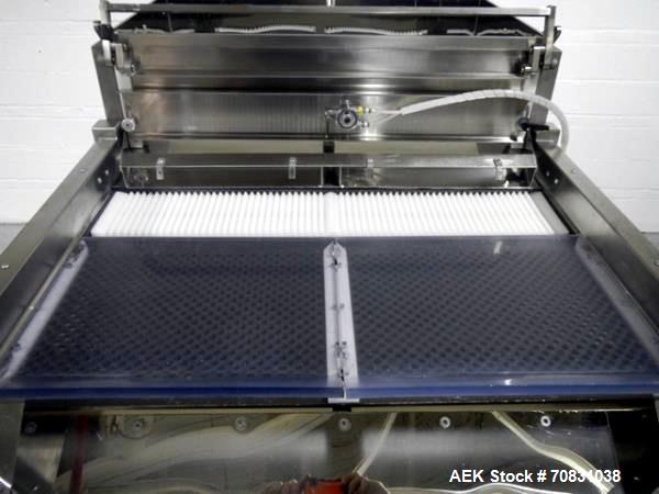 Used Ackely Tablet Sorter, Stainless Steel Construciton. Gravity feed with 14" x 34" wide sorting table, serial# 199, new 1997.